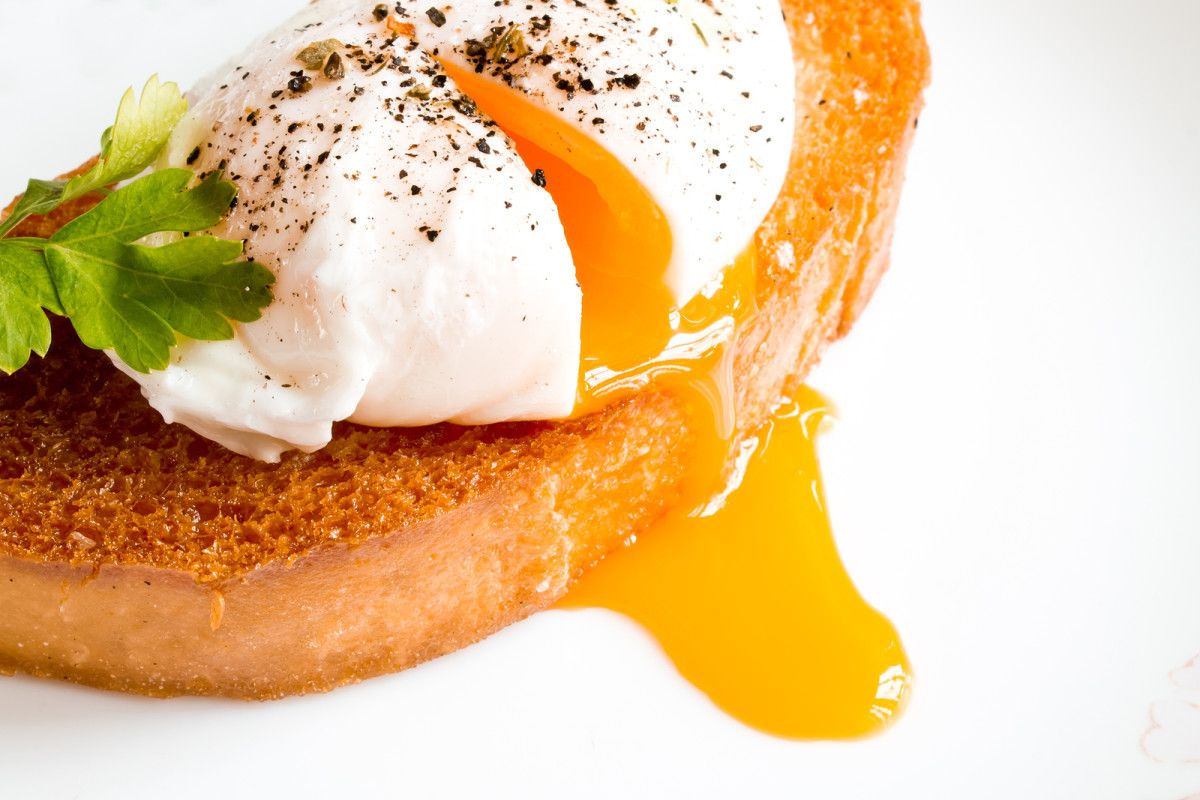Poached eggs will stay in the correct shape while cooking if you use chef's 1 ingredient